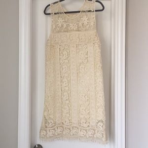 Ivory, knit dress with built in slip.